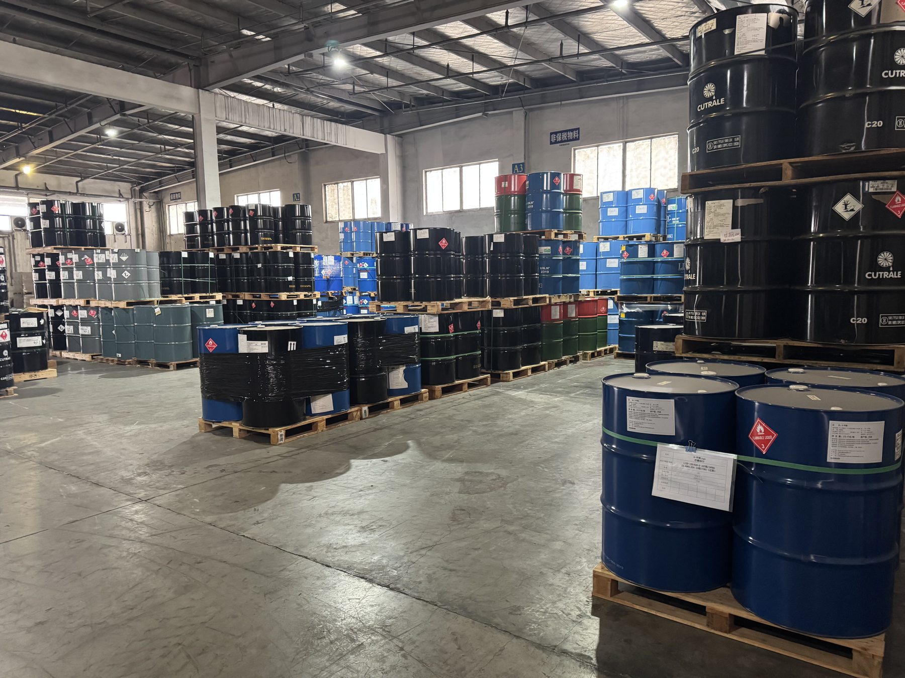 Drums of industrial chemicals on pallets in the licensed hazardous-chemicals warehouse